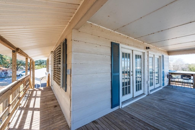 wooden terrace featuring french doors