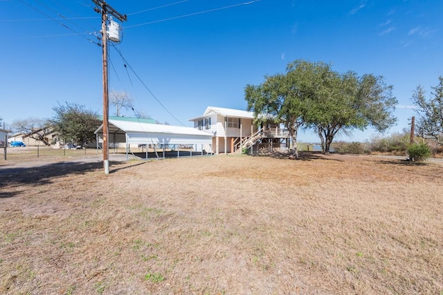 view of yard featuring a carport