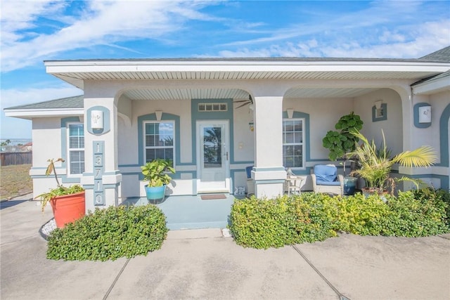 property entrance with covered porch