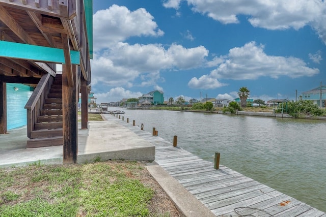 dock area featuring a water view