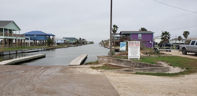 exterior space with a water view