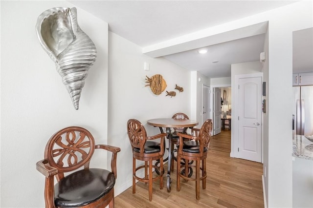 dining room featuring light hardwood / wood-style floors