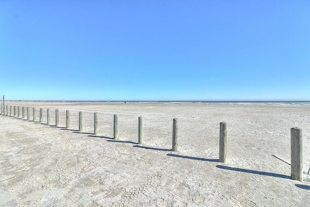 exterior details featuring a view of the beach