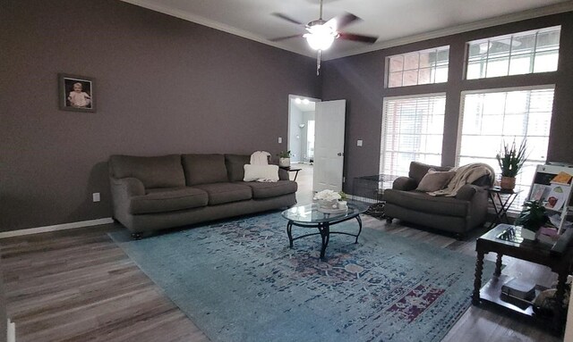 laundry area with washer and clothes dryer, light tile patterned flooring, cabinet space, and baseboards