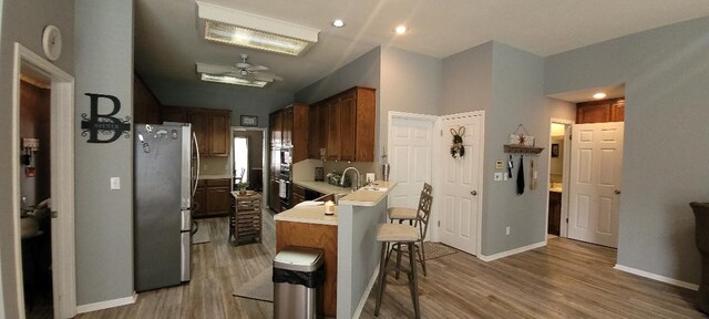 bathroom featuring a bath, a shower stall, visible vents, and a sink