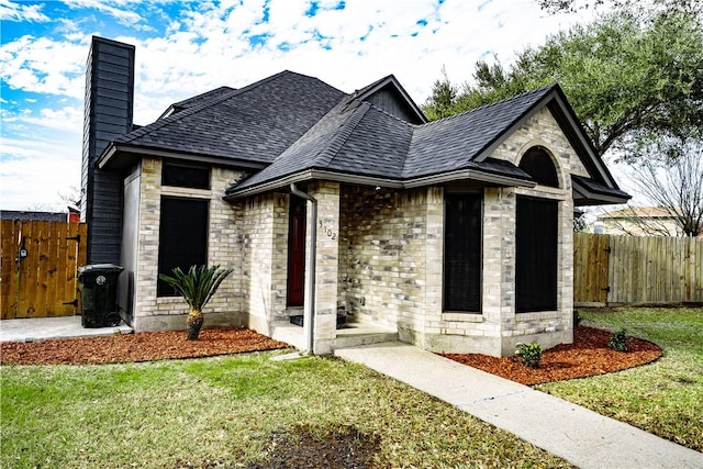 view of front of home with a front yard