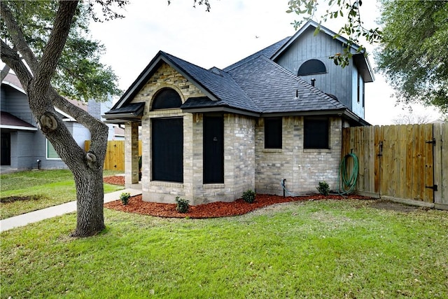 view of front of property with a front lawn