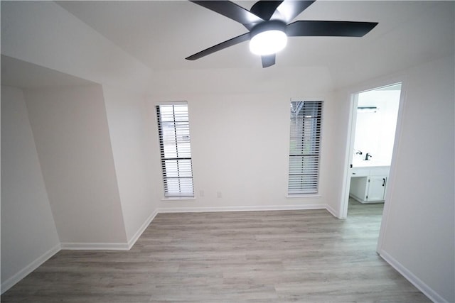 unfurnished room featuring ceiling fan and light hardwood / wood-style floors