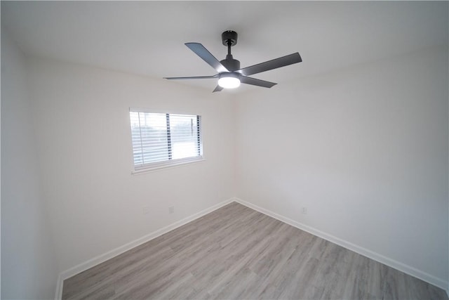 unfurnished room featuring ceiling fan and light hardwood / wood-style floors