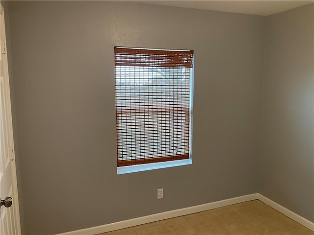 view of tiled spare room