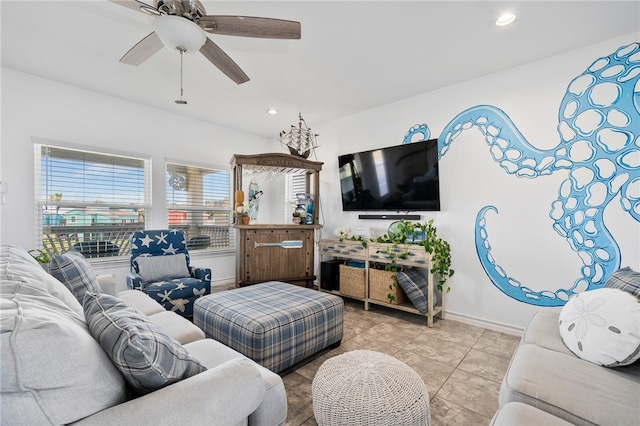 tiled living room featuring ceiling fan