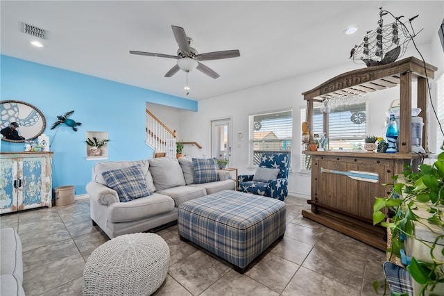 living room featuring ceiling fan