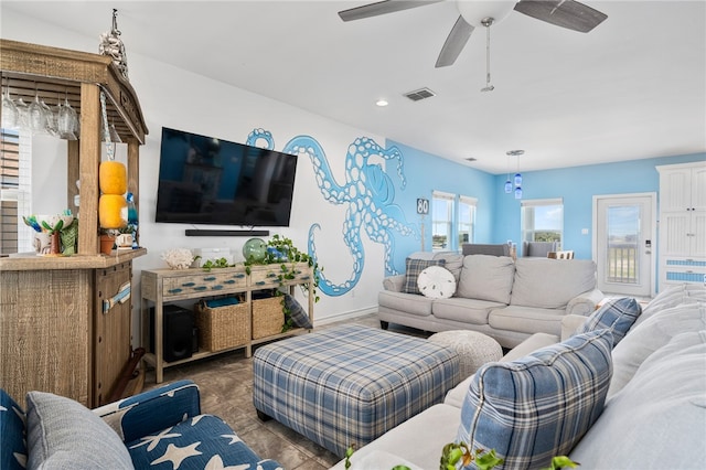 living room featuring ceiling fan