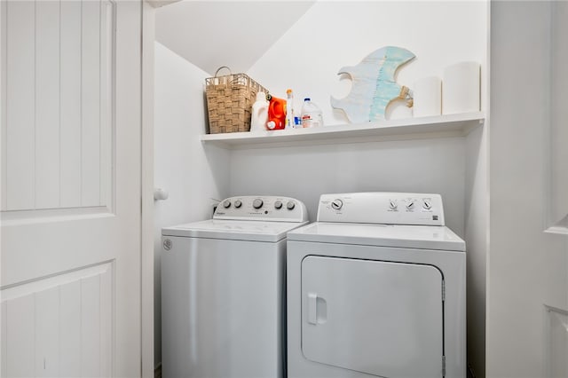 washroom with washer and clothes dryer