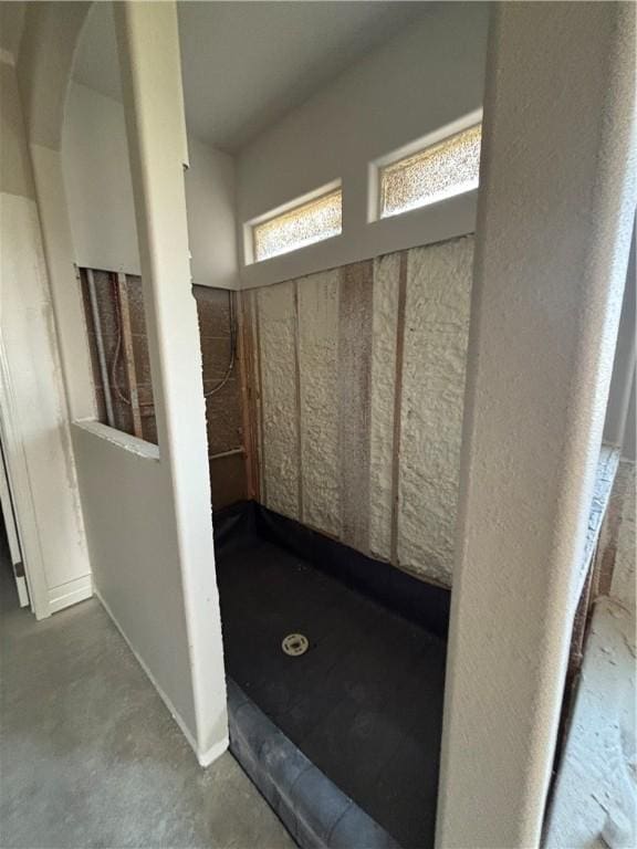 bathroom with concrete floors