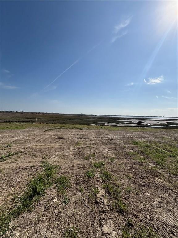 view of yard with a rural view