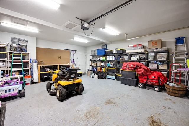 garage featuring a garage door opener