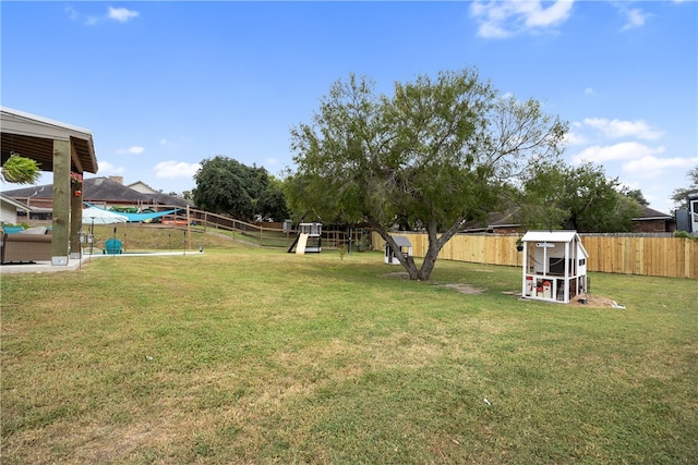 view of yard featuring a playground