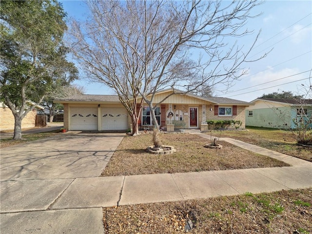 single story home featuring a garage