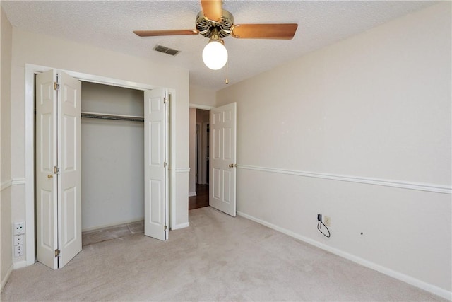 4119 Crenshaw Dr, Corpus Christi, TX 78413 - unfurnished bedroom featuring carpet floors, a closet, a ceiling fan, and baseboards