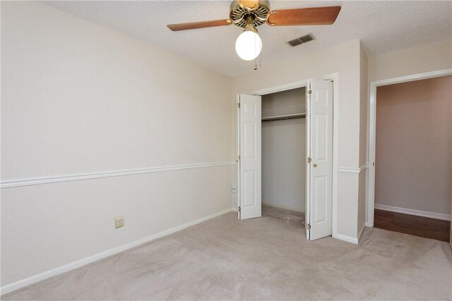 4119 Crenshaw Dr, Corpus Christi, TX 78413 - unfurnished bedroom featuring carpet floors, a closet, baseboards, and a ceiling fan