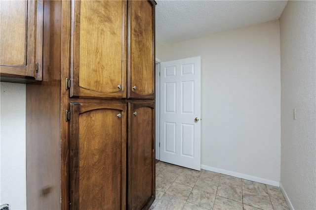 4119 Crenshaw Dr, Corpus Christi, TX 78413 - detailed view of a textured ceiling and baseboards