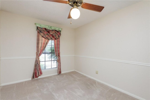 4119 Crenshaw Dr, Corpus Christi, TX 78413 - carpeted empty room with baseboards and a ceiling fan