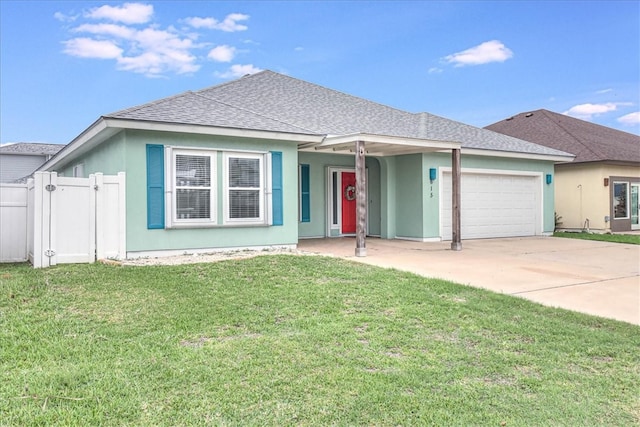 ranch-style house with a garage and a front yard