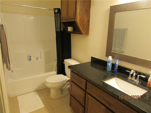 full bathroom featuring toilet, shower / bath combination with curtain, vanity, and tile patterned floors