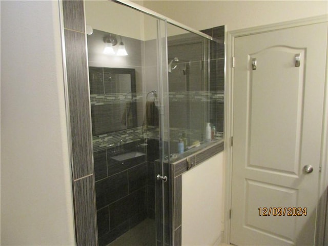 bathroom with an enclosed shower