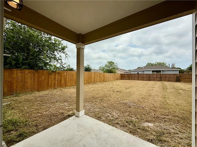 1108 N Staples St, Corpus Christi, TX 78401 - fenced backyard with a patio area