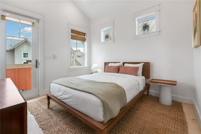 bedroom featuring lofted ceiling