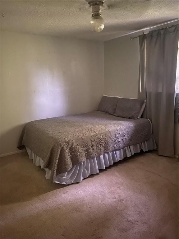 104 Park Pl, Portland, TX 78374 - carpeted bedroom featuring a textured ceiling