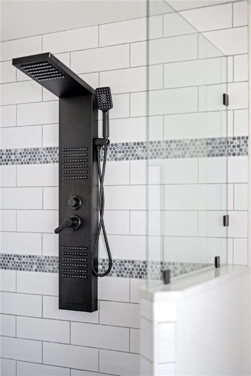 interior space with tiled shower