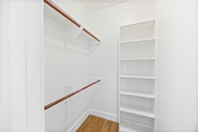 2342 Vaughan Dr, Corpus Christi, TX 78414 - walk in closet with wood finished floors