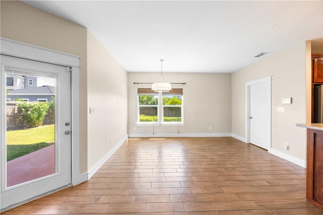 2342 Vaughan Dr, Corpus Christi, TX 78414 - unfurnished dining area with wood finished floors and baseboards