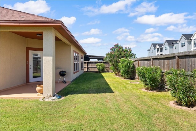 2342 Vaughan Dr, Corpus Christi, TX 78414 - fenced backyard featuring a patio and a residential view