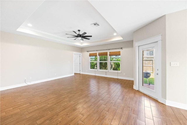 2342 Vaughan Dr, Corpus Christi, TX 78414 - unfurnished room featuring a raised ceiling, ceiling fan, light wood-type flooring, and recessed lighting