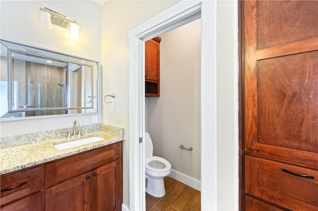 2342 Vaughan Dr, Corpus Christi, TX 78414 - full bath with vanity and wood finished floors