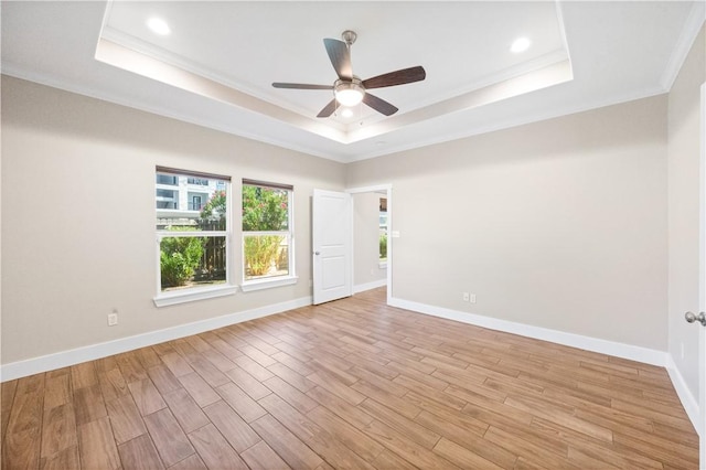 2342 Vaughan Dr, Corpus Christi, TX 78414 - spare room with a raised ceiling, ceiling fan, ornamental molding, light wood-type flooring, and recessed lighting