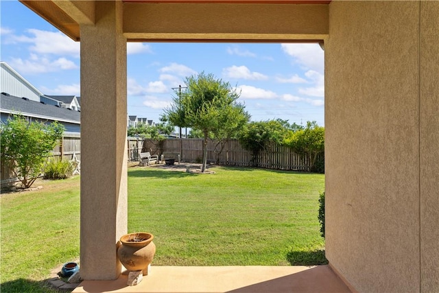 2342 Vaughan Dr, Corpus Christi, TX 78414 - fenced backyard with a patio area