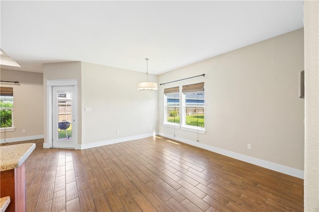 2342 Vaughan Dr, Corpus Christi, TX 78414 - unfurnished living room with wood finished floors and baseboards