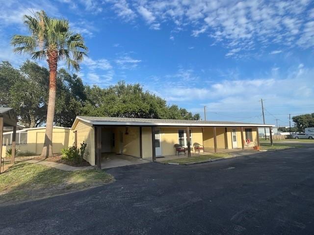 108 Laurel St Unit 11, Fulton, TX 78358 - view of front of house featuring a carport