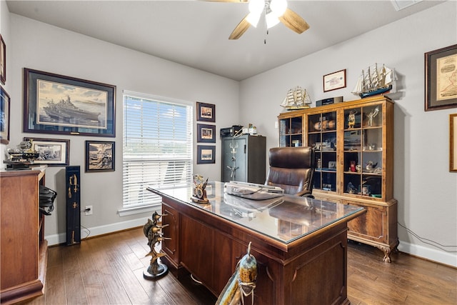 office with ceiling fan and dark hardwood / wood-style flooring