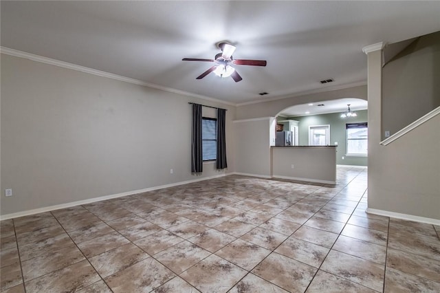 2526 Whirlwind St, Corpus Christi, TX 78414 - empty room featuring ceiling fan, ornamental molding, arched walkways, and light tile patterned flooring