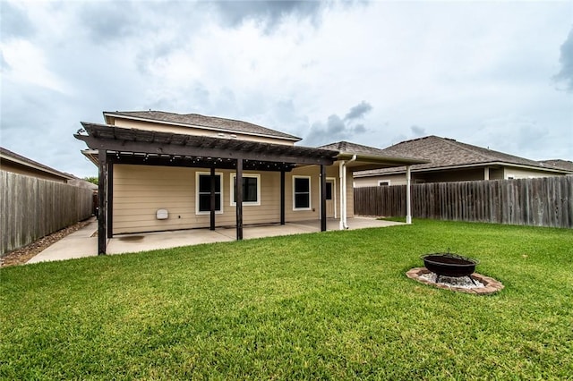 2526 Whirlwind St, Corpus Christi, TX 78414 - rear view of house featuring an outdoor fire pit, a fenced backyard, and a patio