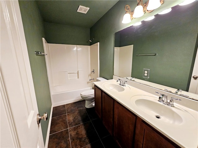 full bathroom featuring toilet, shower / bathing tub combination, vanity, and tile patterned flooring