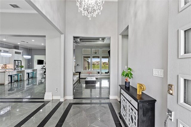 6406 Legacy Pt, Corpus Christi, TX 78414 - entryway featuring visible vents, baseboards, marble finish floor, ornamental molding, and recessed lighting