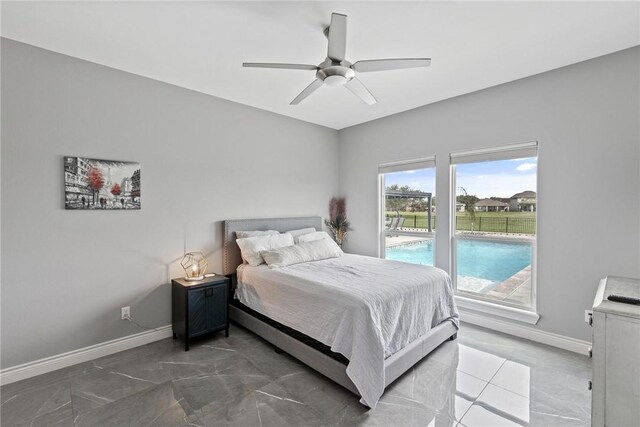 6406 Legacy Pt, Corpus Christi, TX 78414 - bedroom with access to outside, baseboards, and ceiling fan