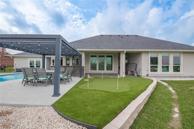 6406 Legacy Pt, Corpus Christi, TX 78414 - back of property with roof with shingles, a fenced in pool, a patio area, and stucco siding